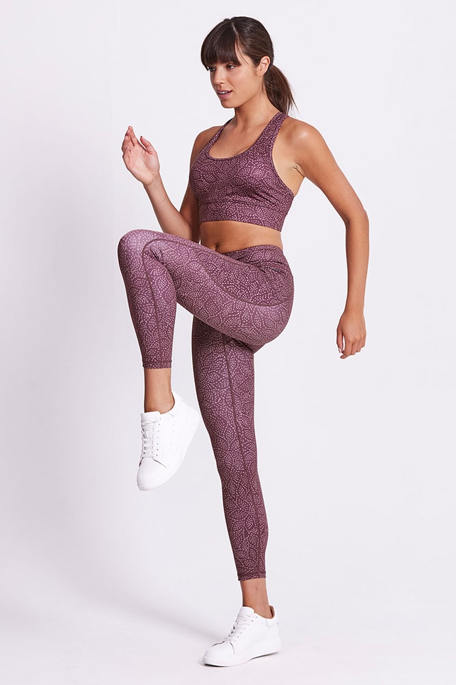 Dharmabums -Motion 78 Legging - Day Dream - Side Front-min Woman wearing a sexy yoga outfit fromDharmabums -Motion 78 Legging - Day Dream - best leggings that hide cellulite